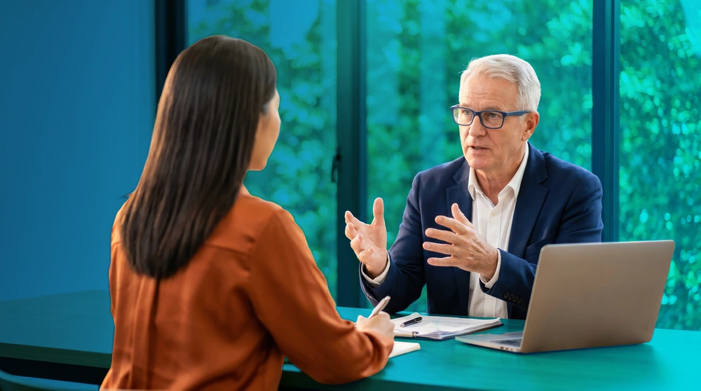 Business funding advisor meeting with a client